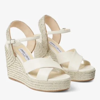 Dellena 100 Latte nappalederen sleehak met metallic koordafwerking