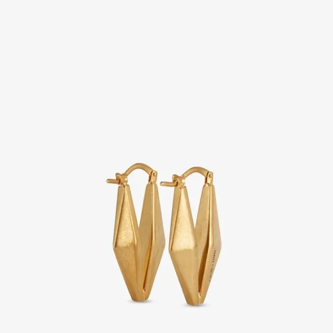Diamanten kettingoorbellen met gouden afwerking Diamanten kettingoorbellen met gouden afwerking