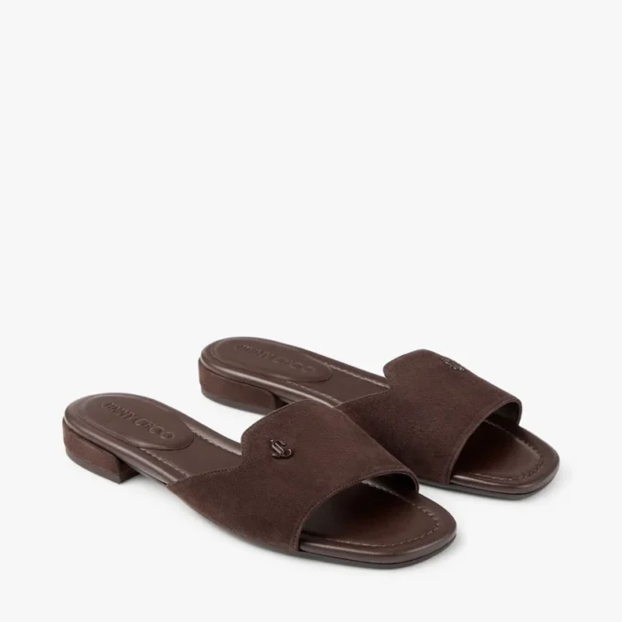Dina platte zwarte nappaleren sandaal met gekruiste bandjes Dina platte zwarte nappaleren sandaal met gekruiste bandjes