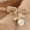 Eleri ballerina Toffee schapenvacht ballerina pumps met parelbedeling