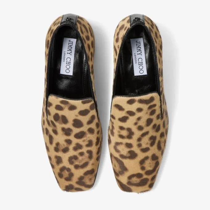 Eliot-slipper 45 Natuurlijke ponyhuid-slippers met luipaardprint Eliot-slipper 45 Natuurlijke ponyhuid-slippers met luipaardprint