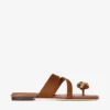 Emeri Stone platte sandalen van tan en amberkleurig suède Emeri Stone platte sandalen van tan en amberkleurig suède