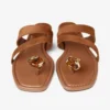 Emeri Stone platte sandalen van tan en amberkleurig suède Emeri Stone platte sandalen van tan en amberkleurig suède