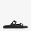 Fayence-sandaal Zwarte leren platte sandalen met parelversiering Fayence-sandaal Zwarte leren platte sandalen met parelversiering