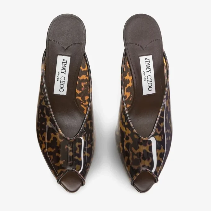 Glace Mule 80 Amber en bruin gemengde TPU-sandalen in schildpadmotief met plexiglas sleehak Glace Mule 80 Amber en bruin gemengde TPU-sandalen in schildpadmotief met plexiglas sleehak