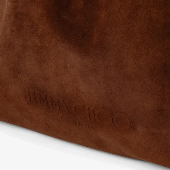 Grote suède en glad kalfsleren draagtas met trekkoord en jimmy choo-logo Grote suède en glad kalfsleren draagtas met trekkoord en jimmy choo-logo