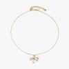 Hanger met lint Gouden metalen hanger met lint en parel