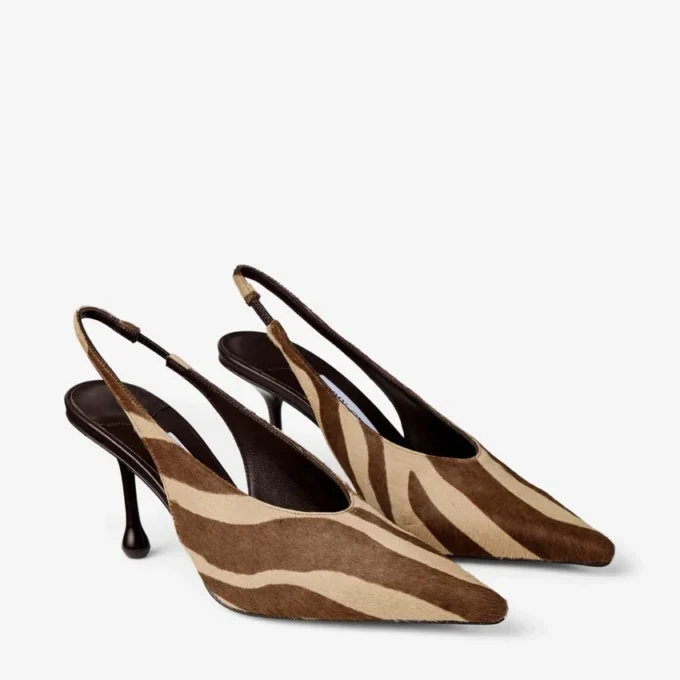 Isa 80 Chocoladebruine ponypumps met zebraprint Isa 80 Chocoladebruine ponypumps met zebraprint