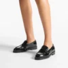 Ivy Loafer Zwarte loafers van leer met krokodillenreliëf