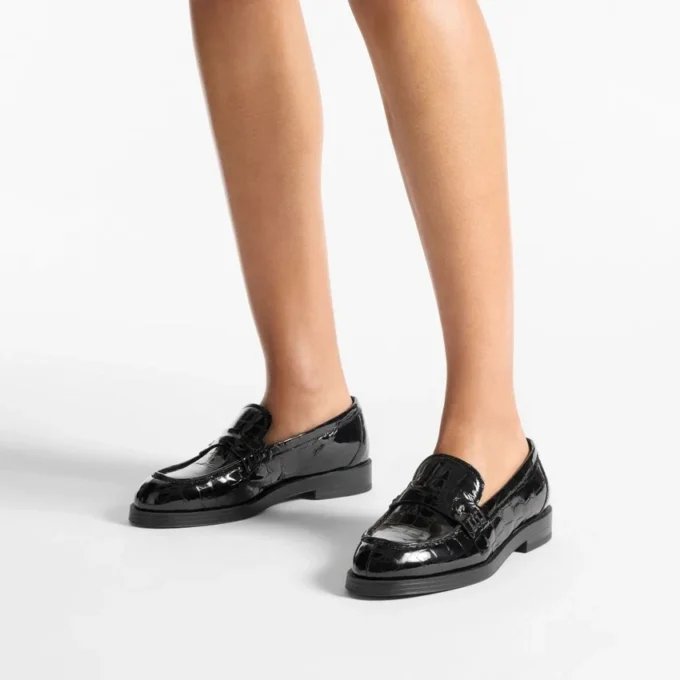 Ivy Loafer Zwarte loafers van leer met krokodillenreliëf
