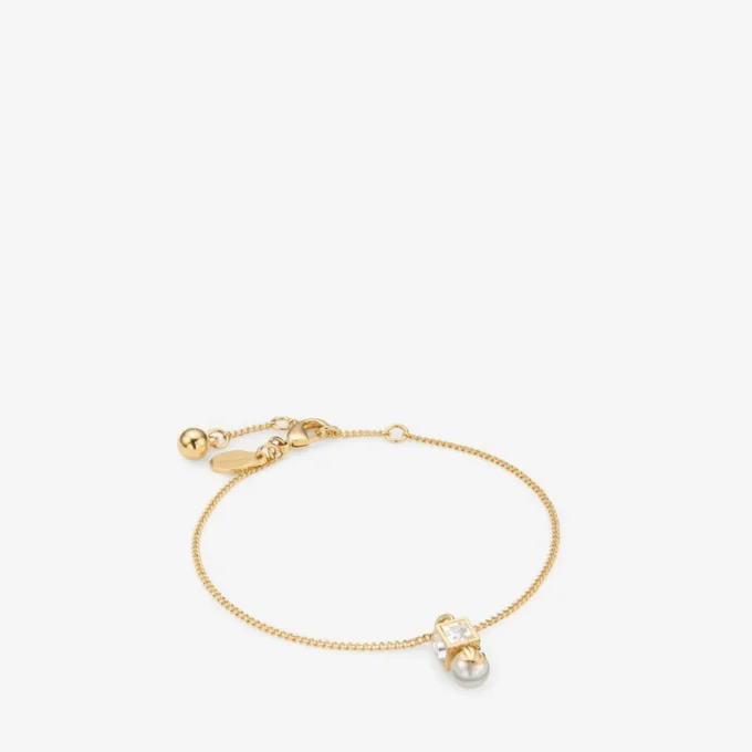 Jc Pearl Cube-armband Gouden metalen armband met parel en kristallen kubus Jc Pearl Cube-armband Gouden metalen armband met parel en kristallen kubus