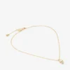 Jc Pearl Cube-hanger Gouden metalen hanger met parel en kristallen kubus Jc Pearl Cube-hanger Gouden metalen hanger met parel en kristallen kubus