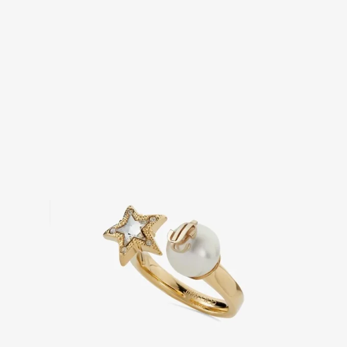 Jc Star Pearl Ring Goudkleurige metalen ring met kristallen ster en parel Jc Star Pearl Ring Goudkleurige metalen ring met kristallen ster en parel