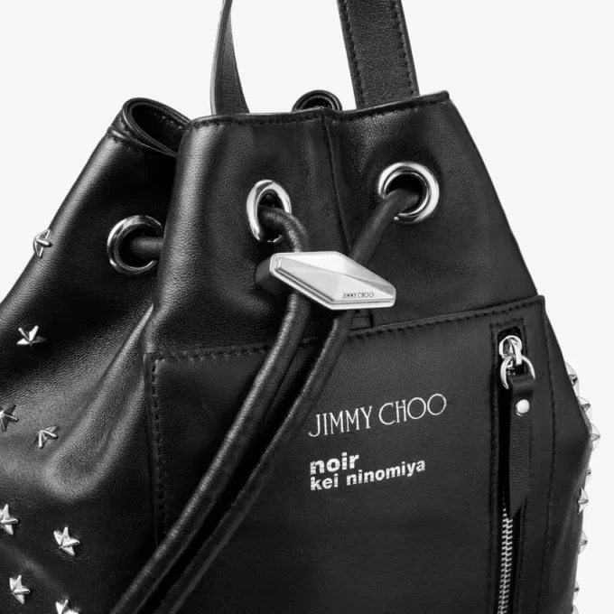 Jimmy Choo Noir Kei Ninomiya-rugzak  Zwarte rugzak van nappaleer met metalen versiering met meerdere sterren
