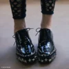 Jimmy Choo Noir Kei Ninomiya Star Schoen Zwarte gepolijste kalfsleren veterschoenen met sterrenversiering Jimmy Choo Noir Kei Ninomiya Star Schoen Zwarte gepolijste kalfsleren veterschoenen met sterrenversiering