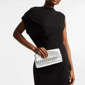 Kya zilvermetalen nappaleren clutch