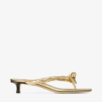 Liss 35 goudkleurige metallic nappaleren muilsandalen met strik