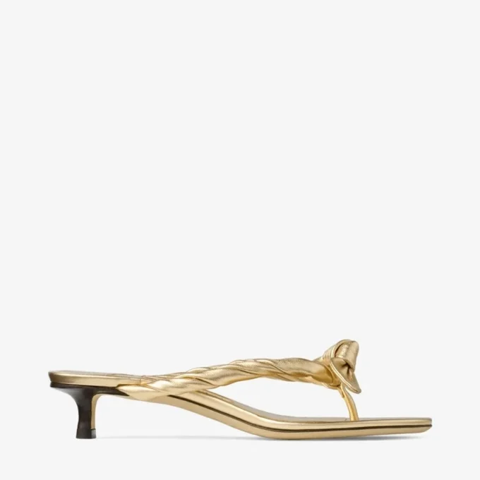 Liss 35 goudkleurige metallic nappaleren muilsandalen met strik Liss 35 goudkleurige metallic nappaleren muilsandalen met strik