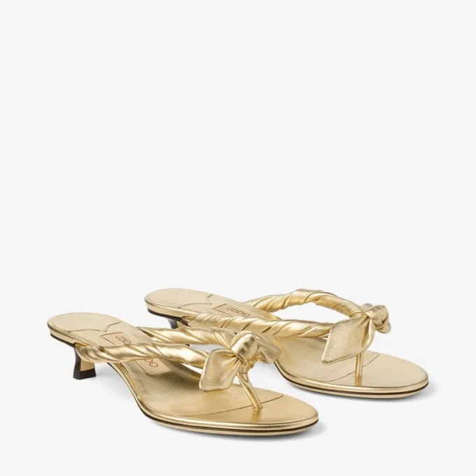 Liss 35 goudkleurige metallic nappaleren muilsandalen met strik Liss 35 goudkleurige metallic nappaleren muilsandalen met strik