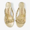 Liss 35 goudkleurige metallic nappaleren muilsandalen met strik Liss 35 goudkleurige metallic nappaleren muilsandalen met strik