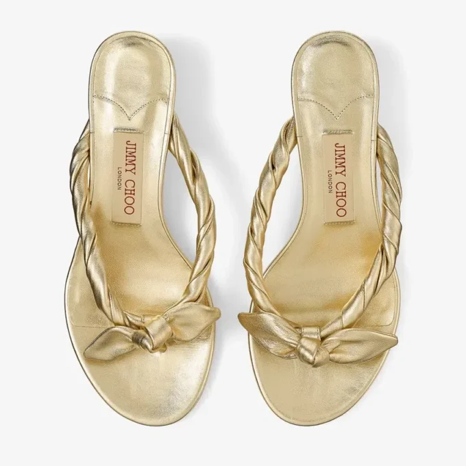 Liss 35 goudkleurige metallic nappaleren muilsandalen met strik Liss 35 goudkleurige metallic nappaleren muilsandalen met strik