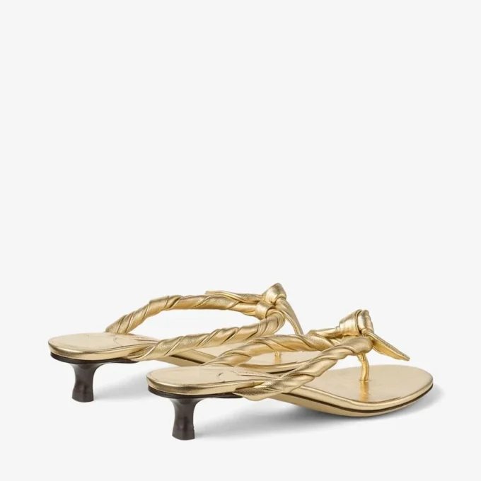 Liss 35 goudkleurige metallic nappaleren muilsandalen met strik Liss 35 goudkleurige metallic nappaleren muilsandalen met strik