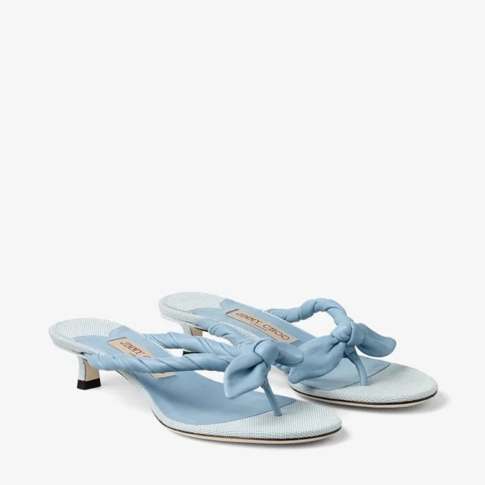 Liss 35 Riviera Blue Mix zachte handschoenleer en gespikkeld canvas muiltjes met nappaleren strik Liss 35 Riviera Blue Mix zachte handschoenleer en gespikkeld canvas muiltjes met nappaleren strik