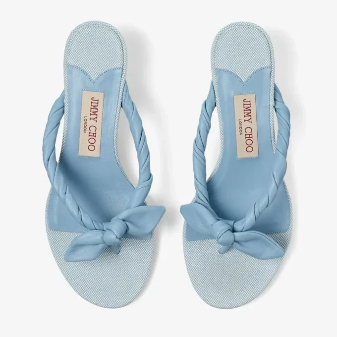 Liss 35 Riviera Blue Mix zachte handschoenleer en gespikkeld canvas muiltjes met nappaleren strik Liss 35 Riviera Blue Mix zachte handschoenleer en gespikkeld canvas muiltjes met nappaleren strik