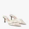 Livi 65 Mules van gemêleerd canvas in amandel- en latte-tinten en zacht handschoenleer met strik van nappaleer Livi 65 Mules van gemêleerd canvas in amandel- en latte-tinten en zacht handschoenleer met strik van nappaleer