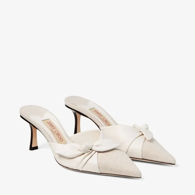 Livi 65 Mules van gemêleerd canvas in amandel- en latte-tinten en zacht handschoenleer met strik van nappaleer Livi 65 Mules van gemêleerd canvas in amandel- en latte-tinten en zacht handschoenleer met strik van nappaleer