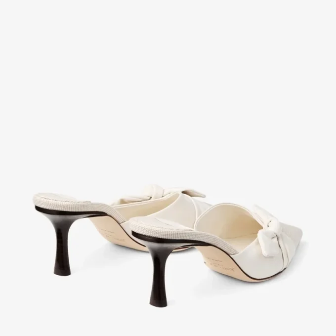 Livi 65 Mules van gemêleerd canvas in amandel- en latte-tinten en zacht handschoenleer met strik van nappaleer Livi 65 Mules van gemêleerd canvas in amandel- en latte-tinten en zacht handschoenleer met strik van nappaleer