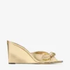 Livi Wedge 85 Goudkleurig metallic nappaleer muiltjes met sleehak en strik Livi Wedge 85 Goudkleurig metallic nappaleer muiltjes met sleehak en strik
