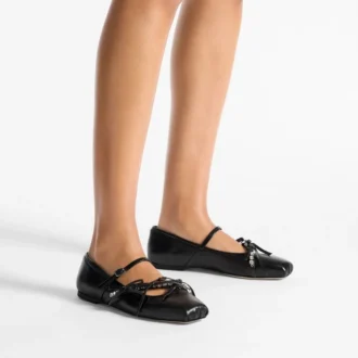 Loli Ballerina Zwarte glanzende nappaleren ballerina’s met strikken van zacht handschoenleer