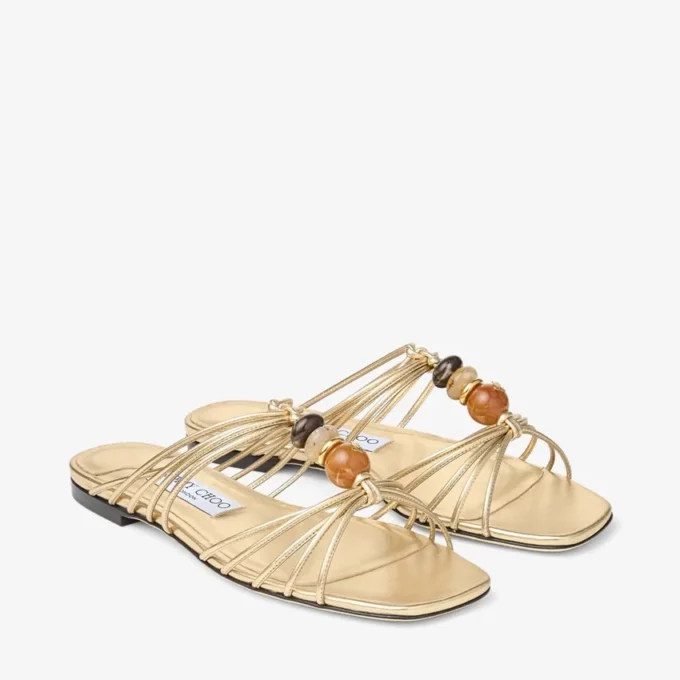 Lova Mule Flat Goudkleurige metallic nappaleren muiltjes met kralen Lova Mule Flat Goudkleurige metallic nappaleren muiltjes met kralen