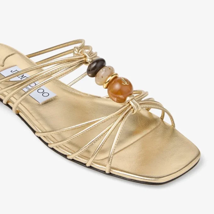 Lova Mule Flat Goudkleurige metallic nappaleren muiltjes met kralen Lova Mule Flat Goudkleurige metallic nappaleren muiltjes met kralen