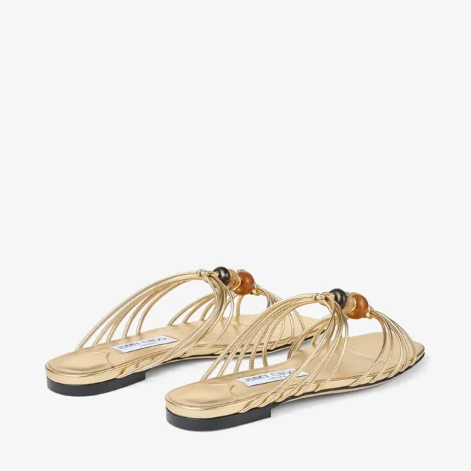 Lova Mule Flat Goudkleurige metallic nappaleren muiltjes met kralen Lova Mule Flat Goudkleurige metallic nappaleren muiltjes met kralen