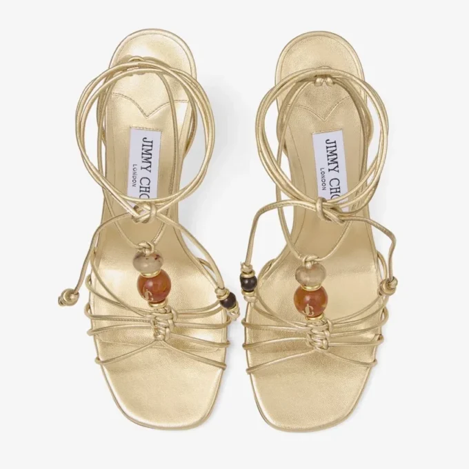 Lova Wedge 85 Goudkleurige metallic nappaleren sleehakken met kralen Lova Wedge 85 Goudkleurige metallic nappaleren sleehakken met kralen