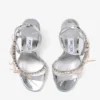 Lula 100 zilveren en macaronkleurige sandalen van Liquid Metal-leer met fluwelen strikken