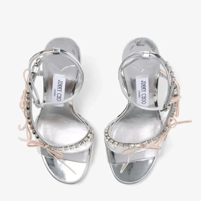 Lula 100 zilveren en macaronkleurige sandalen van Liquid Metal-leer met fluwelen strikken