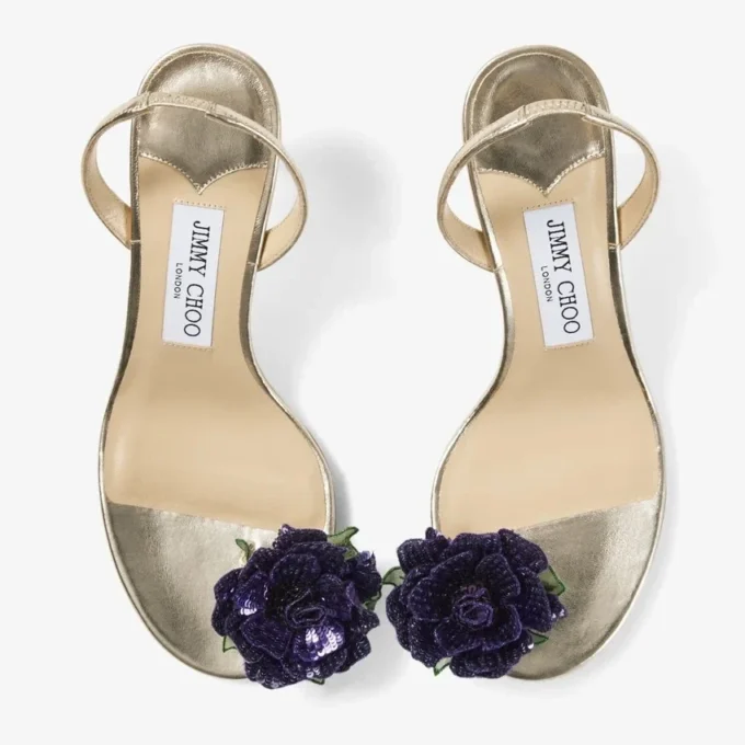 Metalen nappaleren sandaal met bloemencorsage Metalen nappaleren sandaal met bloemencorsage