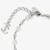 Parel- en kristallen enkelbandje Zilverkleurig metalen enkelbandje met parel-, kristal- en JC-monogramhangers