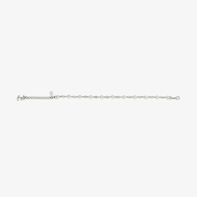 Parel- en kristallen enkelbandje Zilverkleurig metalen enkelbandje met parel-, kristal- en JC-monogramhangers