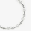Parel- en kristallen enkelbandje Zilverkleurig metalen enkelbandje met parel-, kristal- en JC-monogramhangers