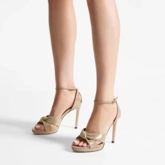Rosie 100 goudglanzende suède plateausandalen