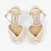 Sacora 100 witte satijnen sandalen met parels over het hele oppervlak Sacora 100 witte satijnen sandalen met parels over het hele oppervlak