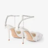 Saeda 100 ivoorkleurige mesh pumps met bloembladborduursel