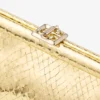 Skylar gouden Candy Wrap-leren clutch met vierkante Jc-sluiting Skylar gouden Candy Wrap-leren clutch met vierkante Jc-sluiting