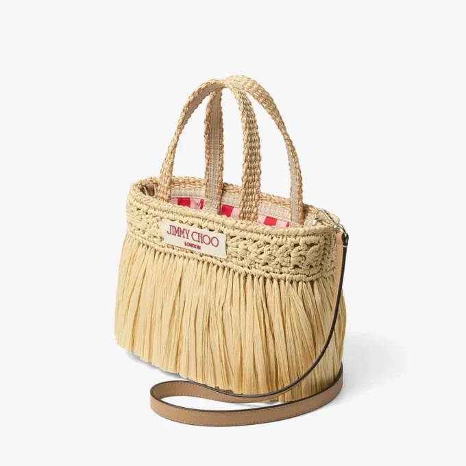 Strandtas East-West Mini Natuurlijke en lichtgouden geweven raffia mini-strandtas met franjes Strandtas East-West Mini Natuurlijke en lichtgouden geweven raffia mini-strandtas met franjes