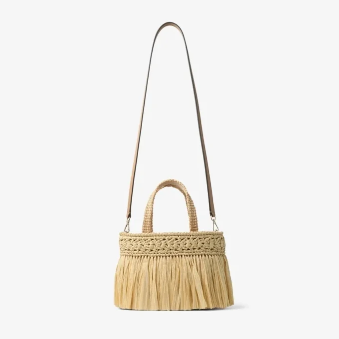 Strandtas East-West Mini Natuurlijke en lichtgouden geweven raffia mini-strandtas met franjes Strandtas East-West Mini Natuurlijke en lichtgouden geweven raffia mini-strandtas met franjes