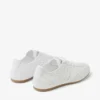Sunny F lage sneakers van wit en gumkleurig leer Sunny F lage sneakers van wit en gumkleurig leer
